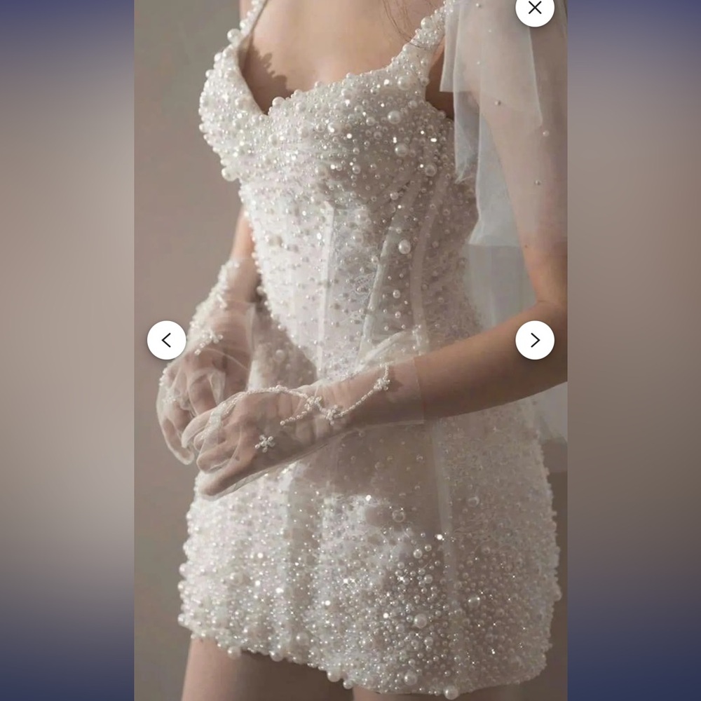 Elegant White Beaded Dress